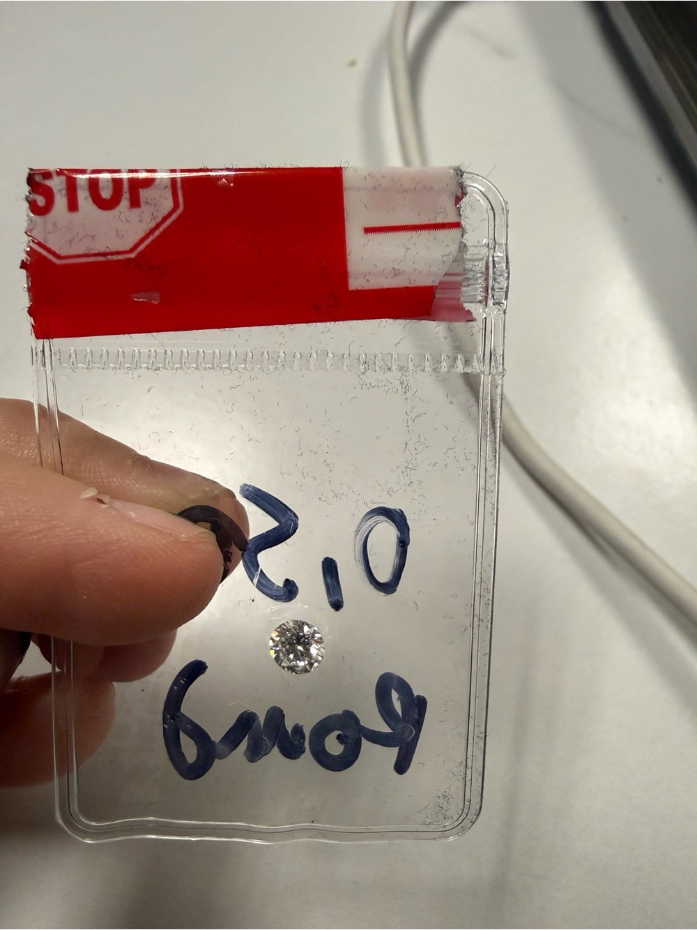 .5 carat round lab grown diamond.  Stunning!
